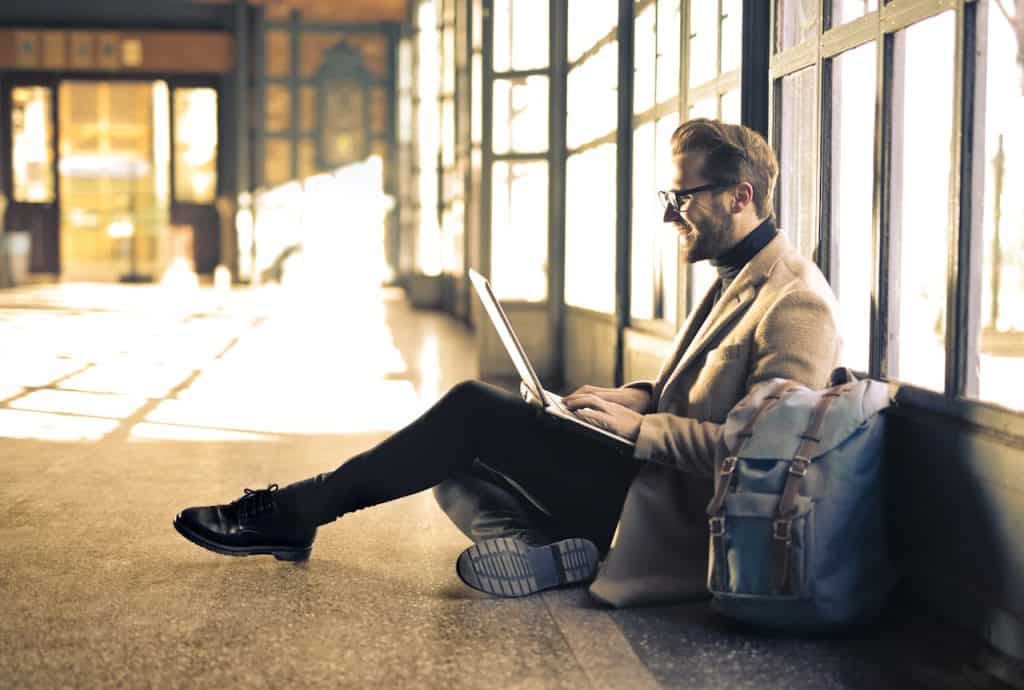 Man Wearing Gray Blazer learning online